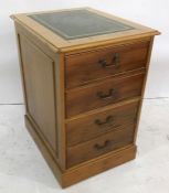Modern yew office two-drawer filing cabinet with green leather inset to the rectangular top, with