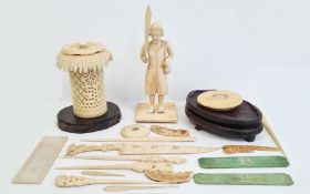 Small collection of antique carved ivory to include standing male figure with broad bladed knife,