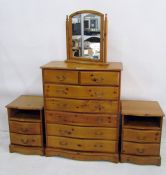 20th century serpentine fronted chest of six drawers, two pine bedside chests and a table-top mirror
