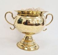 19th century high polished brass two-handled bowl on stepped pedestal base, 28cm high and a