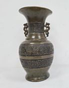 19th century Chinese green glazed vase with an ovoid body and decorated with Greek Key motif, with