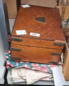 Brass cornered sewing box and contents, a quantity of materials, offcuts and two suitcases