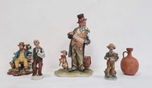 Collection of four various Capodimonte-style unglazed pottery figures to include a Portuguese