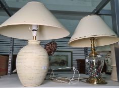 Glass and brass-coloured metal table lamp filled with glass beads and another ceramic table lamp (2)