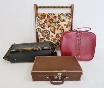 Gladstone bag (some damage), a small brown fibre suitcase, a red plastic vanity case and a stained