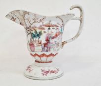 Late 19th century Chinese porcelain footed jug painted in famille rose colours with figures in
