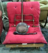 Single futon bed, copper warming pan, vintage coping saw, and a wooden shillelagh