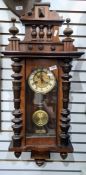 20th century mahogany wall Vienna regulator-style clock with brass and enamel-effect dial, Roman