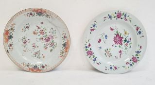 Two 18th century Chinese porcelain plates, floral decorated in famille rose colours (one with