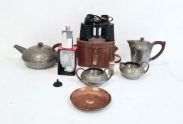 Four-piece Liberty Tudric pewter spot hammered teaset comprising teapot, hot water jug, milk jug and