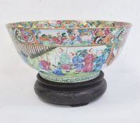 19th century Chinese Canton porcelain punchbowl painted with figures in interior and gardens,