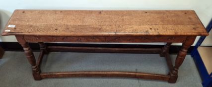 Oak bench, the rectangular top on four turned supports, block feet, stretchered base, 112cm x