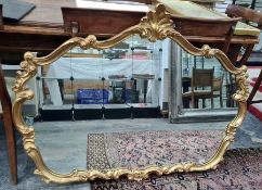 Large overmantel mirror, the shaped plate in moulded scrolling frame in the rococo manner, 90cm x