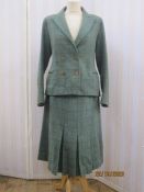 A 1940's ladies green and brown checked wool suit, labelled 