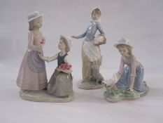 Nao figure of a girl with puppy and laundry, 25cm high, a Nao figure of two girls with posy of