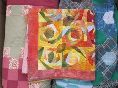 Various modern patchwork quilts, patchwork pieces and a large quantity of small remnants for