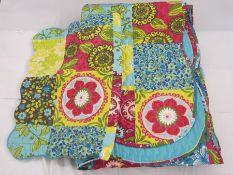 20th century quilt in turquoise, pink, yellow and green with turquoise backing with matching
