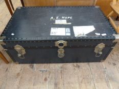 Large vintage travelling trunk with British Parcel Service label, containing a quantity of