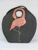 Lulu Guinness circular straw beach bag embroidered in a flamingo, in raffia on straw