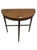 20th century teak demi lune table on straight supports united by stretchers, 72cm wide