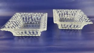 Pair of Lalique square dishes with flared rims, the sides decorated with roses, on a trellis