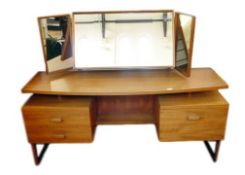 1967 G-Plan bed teak bedroom suite comprising three-door wardrobe with two sliding and one opening