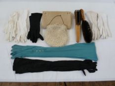 Assorted lady's fabric vintage gloves, a gold thread embroidered evening bag, another and two