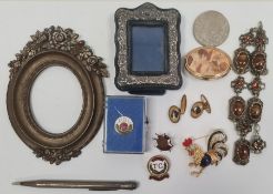Silver cased propelling pencil, a brass picture frame of oval form with cold painted flowers, a