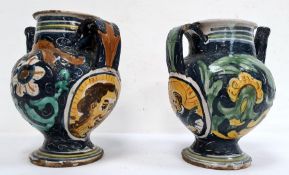 Pair 18th century Italian pottery wet drug jars, each with spout and painted on a blue ground with