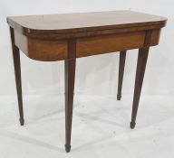 19th century carved table, the rectangular top with rounded front corners, square section tapering