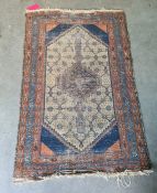 Eastern rug, the cream ground central field with allover flower decoration, on a stepped border,