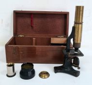 Early 20th century monocular microscope in wooden case