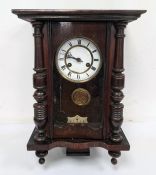 20th century Vienna regulator style clock with Roman numerals to the ceramic dial