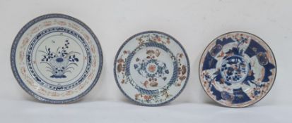 Three various Chinese porcelain plates, variously decorated in principally iron-red and blue, with