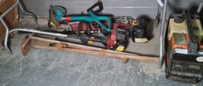 A collection of petrol and electric garden power tools including two petrol and one Black and Decker
