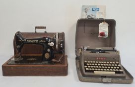 Royal De-Luxe portable typewriter in carrying case and with instructions and a Singer sewing machine