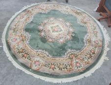 Modern Chinese superwash rug, the green ground with central medallion, stepped border decorated with