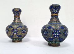 Pair 20th century Chinese cloisonne enamelled vases, baluster shaped and with blue and white lotus