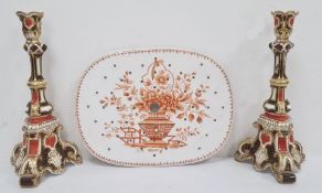 Pair of Wedgwood candlesticks, tapered, in red, black and white with gold highlights, marked to base