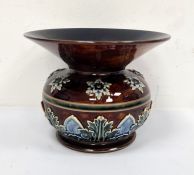 Doulton Lambeth spittoon vase of circular form with flared rim, decorated with stylised leaves and