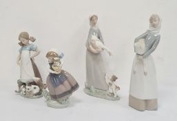 Lladro figure of a girl with kittens, a Lladro figure of a girl with goose and puppy, a Lladro