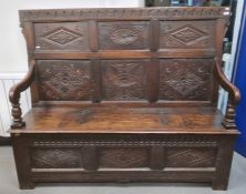 19th century oak bench with carved panelled back, lift-top box seat, fronted by three diamond carved