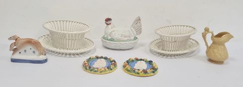 Flatback-type figure of a pair of greyhounds, a  pair of Creil creamware oval baskets on trays, a