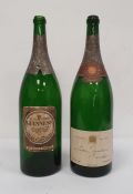 Two empty jeroboam bottles, one with an Extra Stout Guinness label with facsimile signature and '