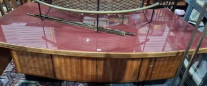 Modern desk of curved form with assorted drawers, 230cm wide