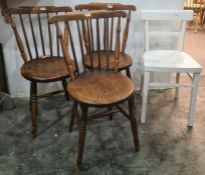 Three elm seated stickback chairs and one white painted chair (4)