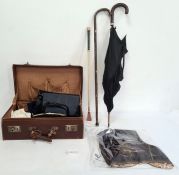 Leather suitcase and contents including vintage handbags, an umbrella and a box of textiles