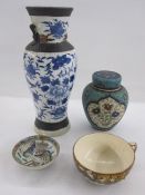 Japanese cloisonne enamel and earthenware vase and cover, ovoid, floral decorated panels, on a