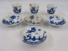 Three, probably 18th century, Chinese porcelain beakers of inverse bell shape, underglaze blue