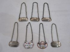 Pair of 19th century sherry and port silver labels, three smaller labels 'Port', 'Madeira' and '